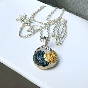 Elegant Silver and Gold Pendant Necklace